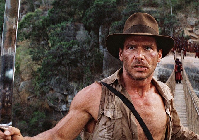 Watch a real-life Indiana Jones get crushed by a giant inflatable boulder